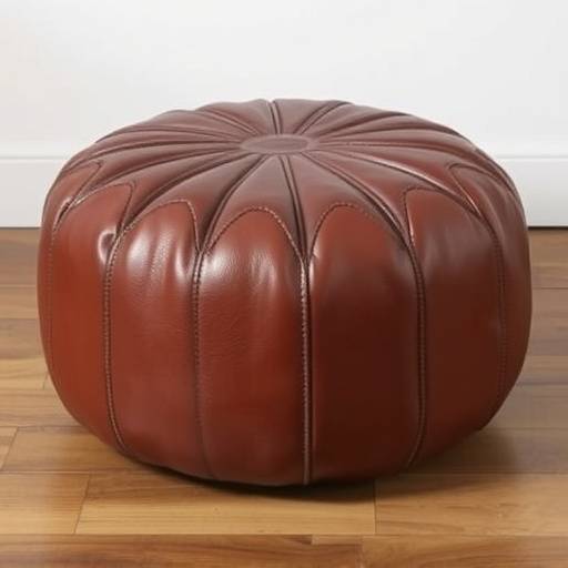 Leather pouf in a rich brown color with stitched detailing